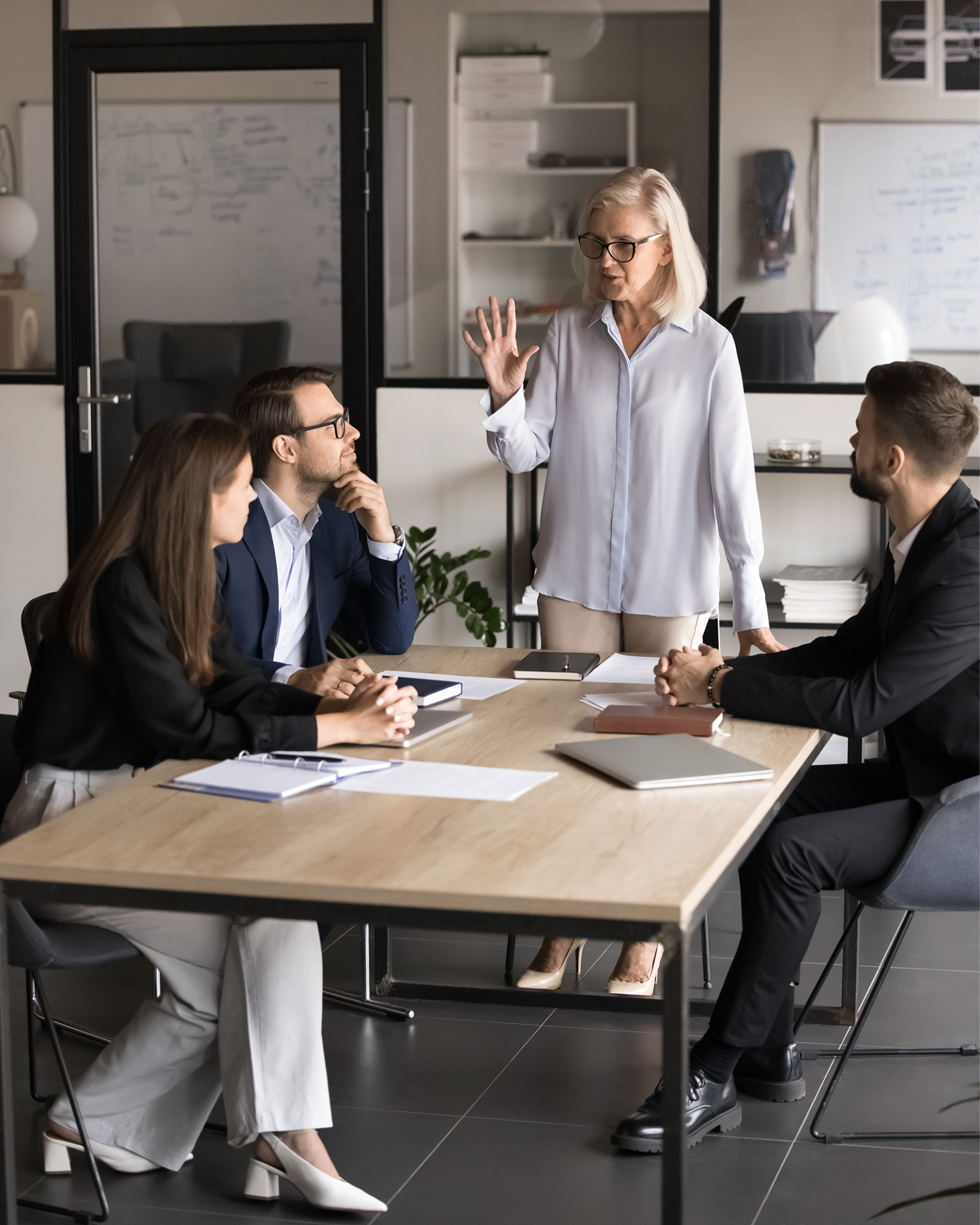 Team in a working session around a meeting table